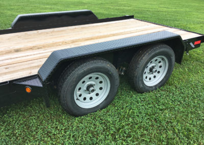 Car hauler trailer with slide-in ramps